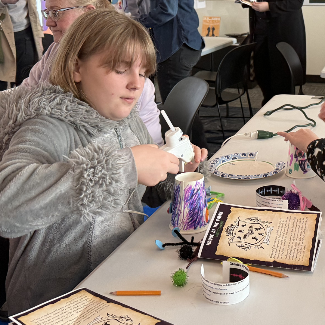 guest crafting at museum event