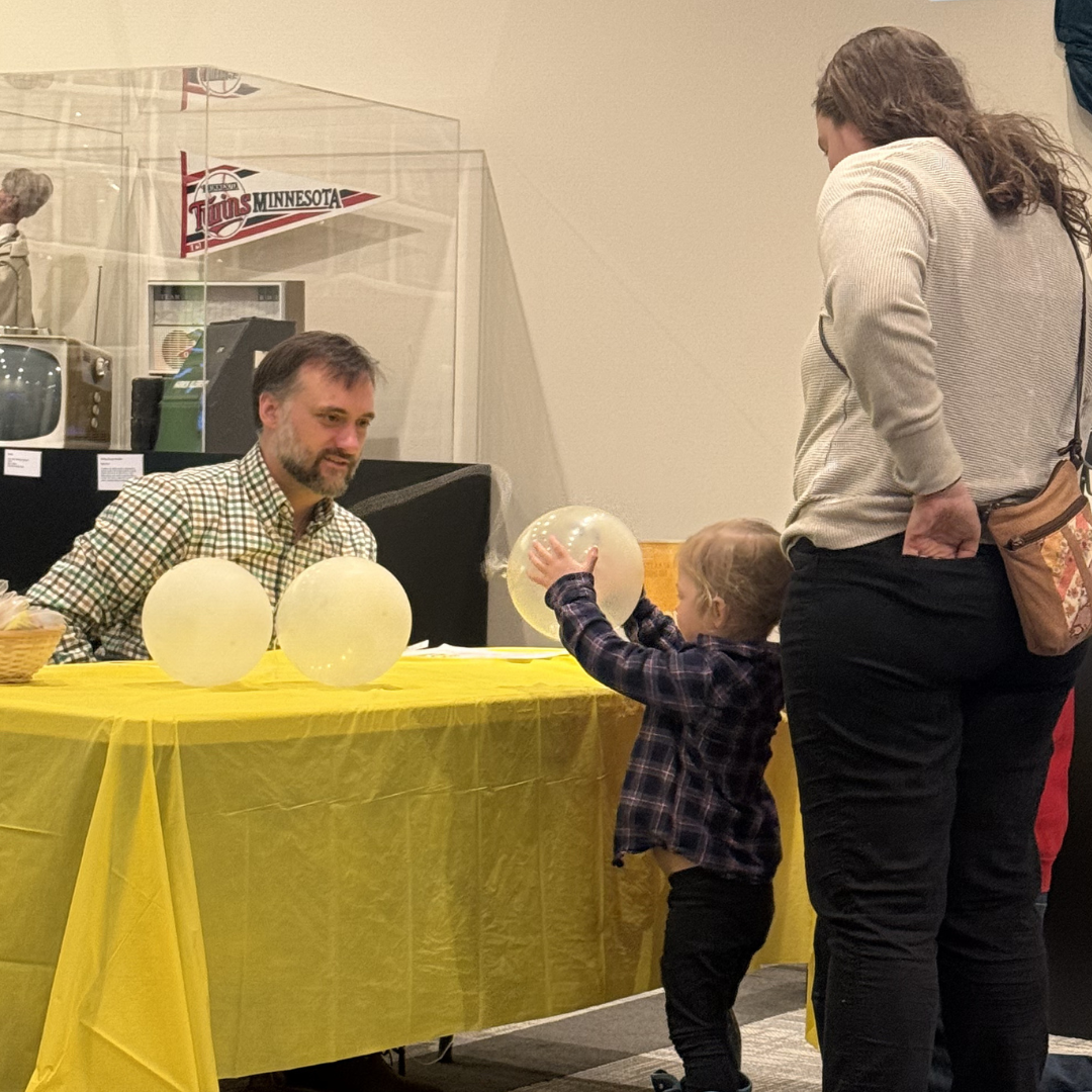 guest doing experiment at event
