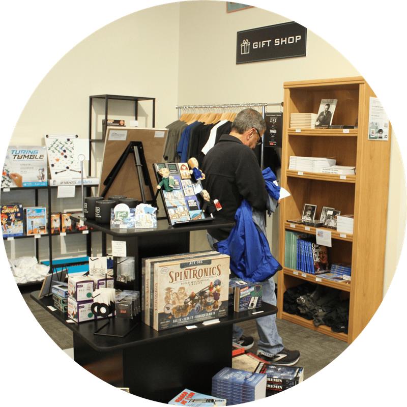 museum guests in gift shop
